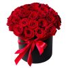 Фото товара 21 червона троянда в капелюшній коробці